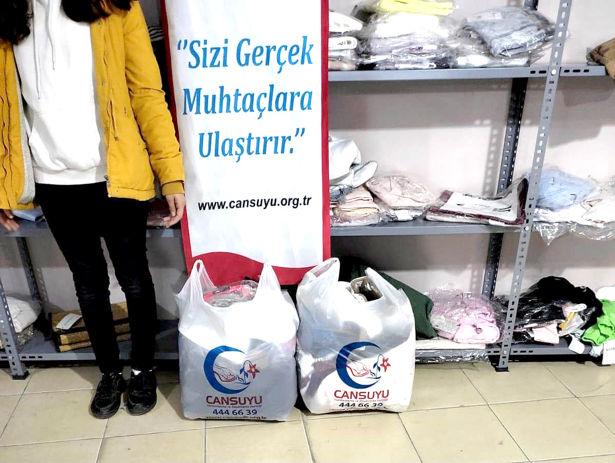 Cansuyu’dan 200 aileye kışlık giyim yardımı